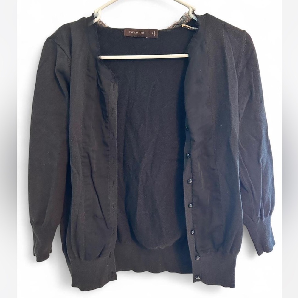 The limited black cardigan size medium